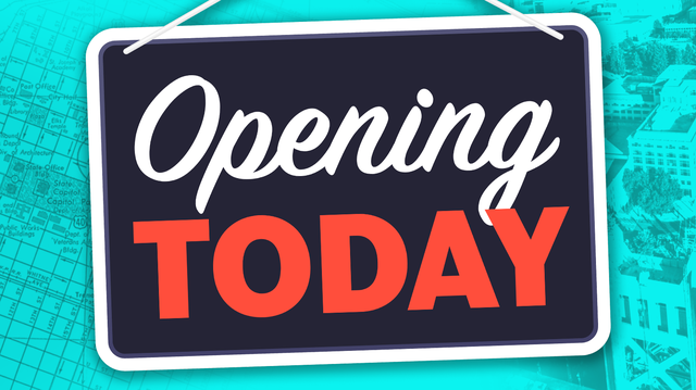 Opening Today sign using a chalkboard with lettering.